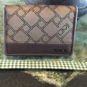 TUMI wallet canvas and leather
